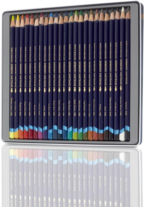 Open tin with 24 labeled Derwent Inktense pencils, including Antique White and Outliner at the right