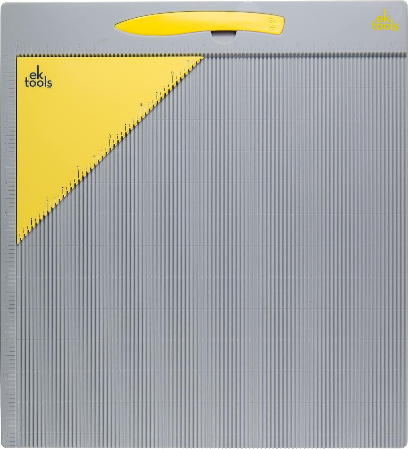 Gray EK Tools standard scoring board with vertical grooves, a yellow bone folder and triangular envelope guide
