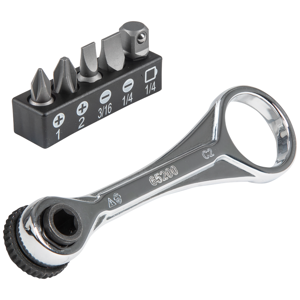 Klein Tools 65200 mini ratchet set arranged beside its included bits and adapter