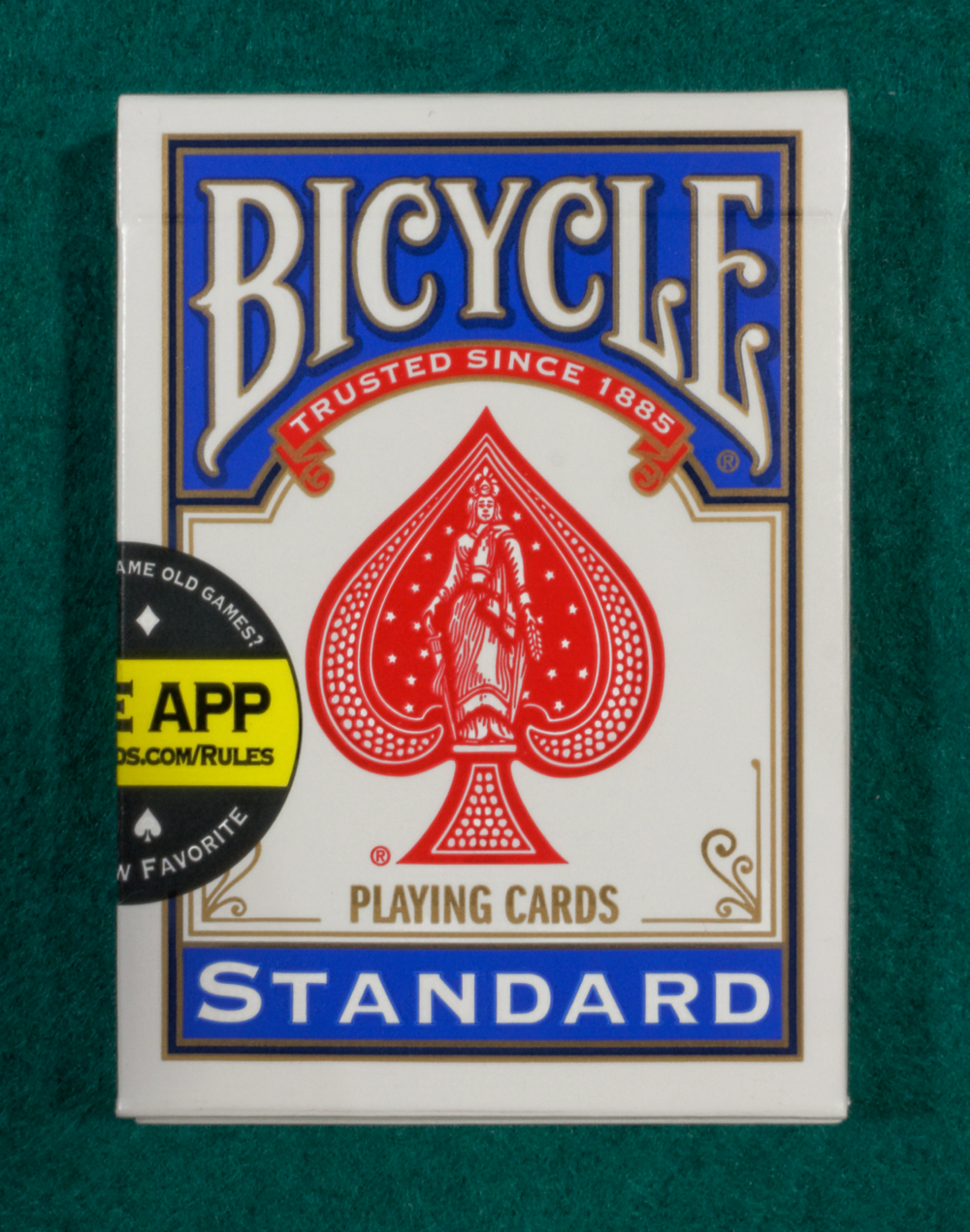 Blue Bicycle Standard playing-card tuck box in older packaging, photographed in 2016, with an old app sticker.