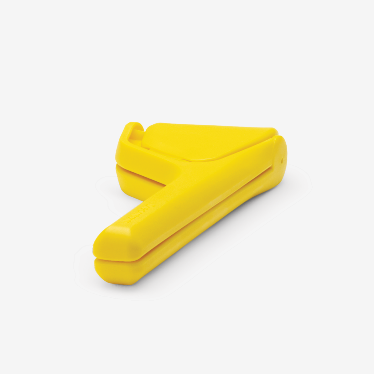 Yellow Dreamfarm Lemon Fluicer folded flat with its handles together