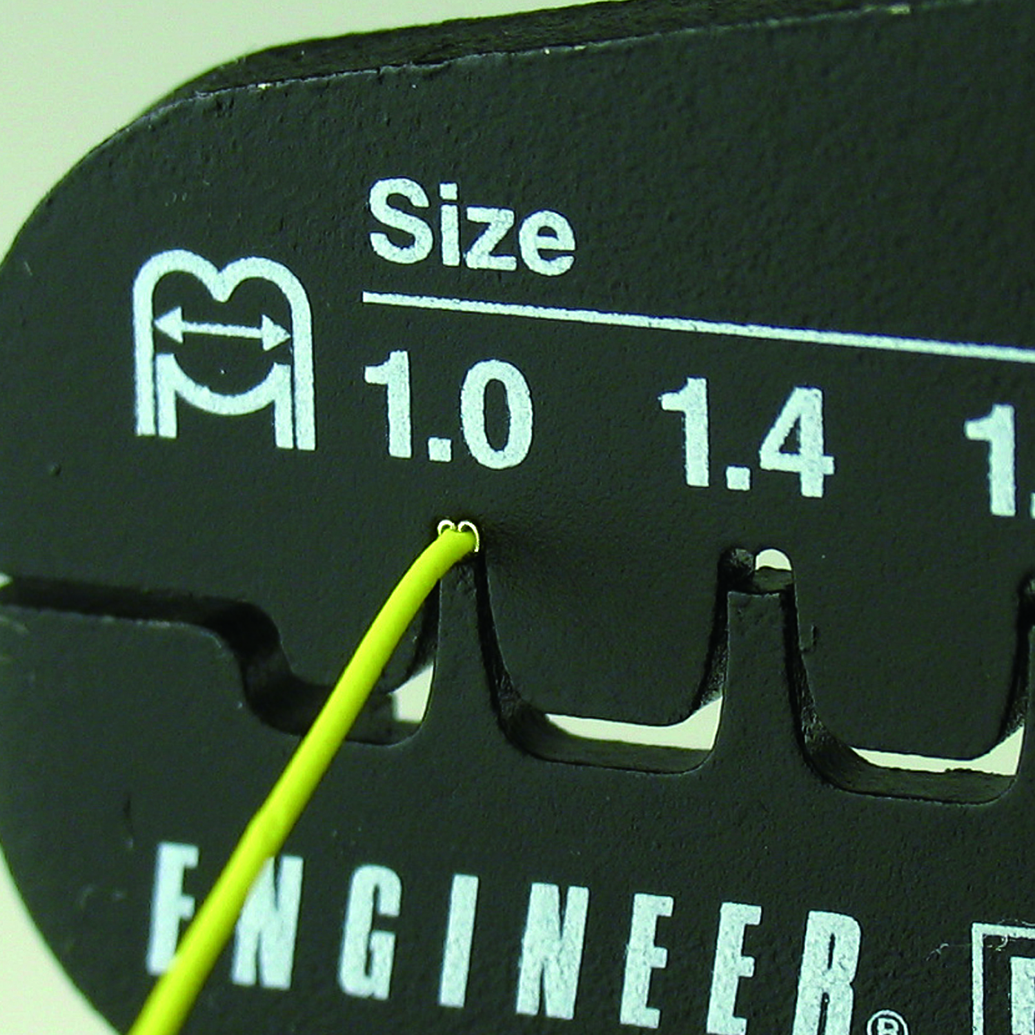 Manufacturer close-up of a small contact positioned in the marked PA-09 die.