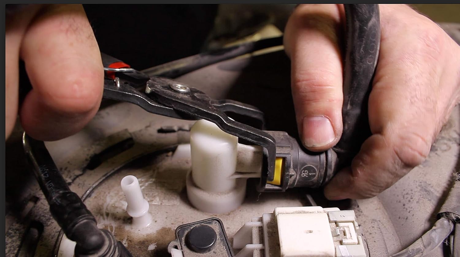 Lisle 37160 angled jaws positioned at a tabbed vehicle connector beside a white fitting.