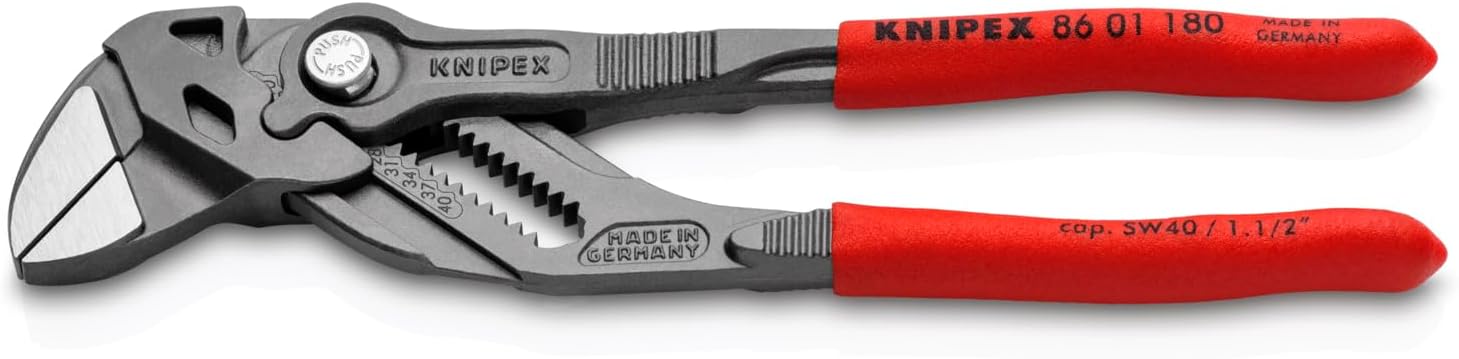 Open-handle KNIPEX 86 01 180 showing push button, smooth jaw faces and numbered adjustment rack