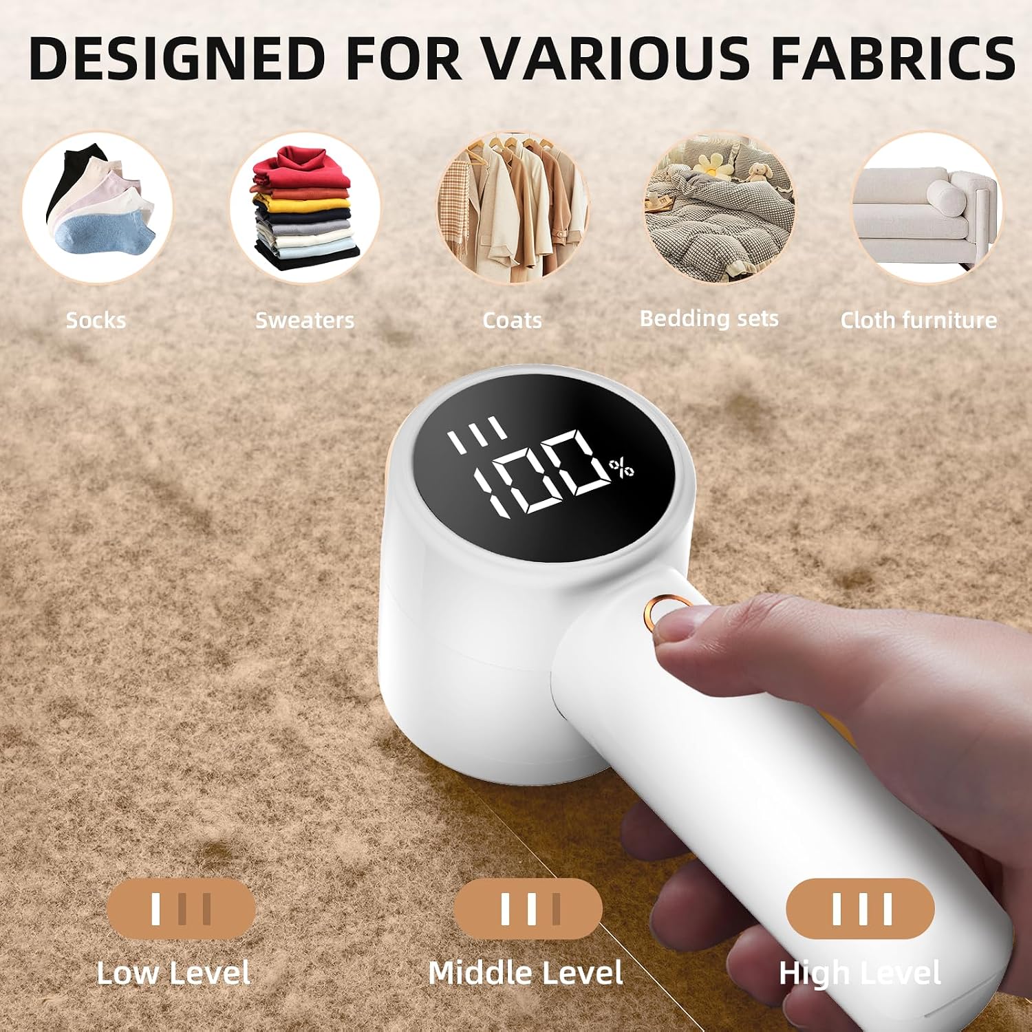 Hand holding the matching white Q20 over a flat fabric surface