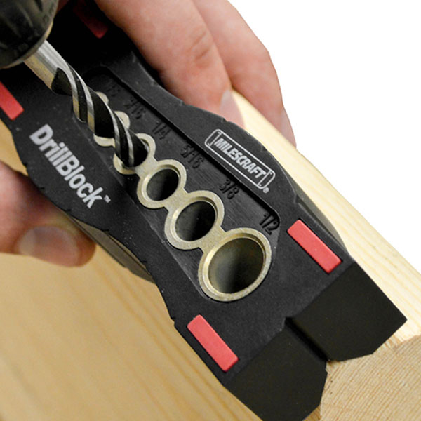 Black Milescraft 1312 DrillBlock guiding a bit on curved stock