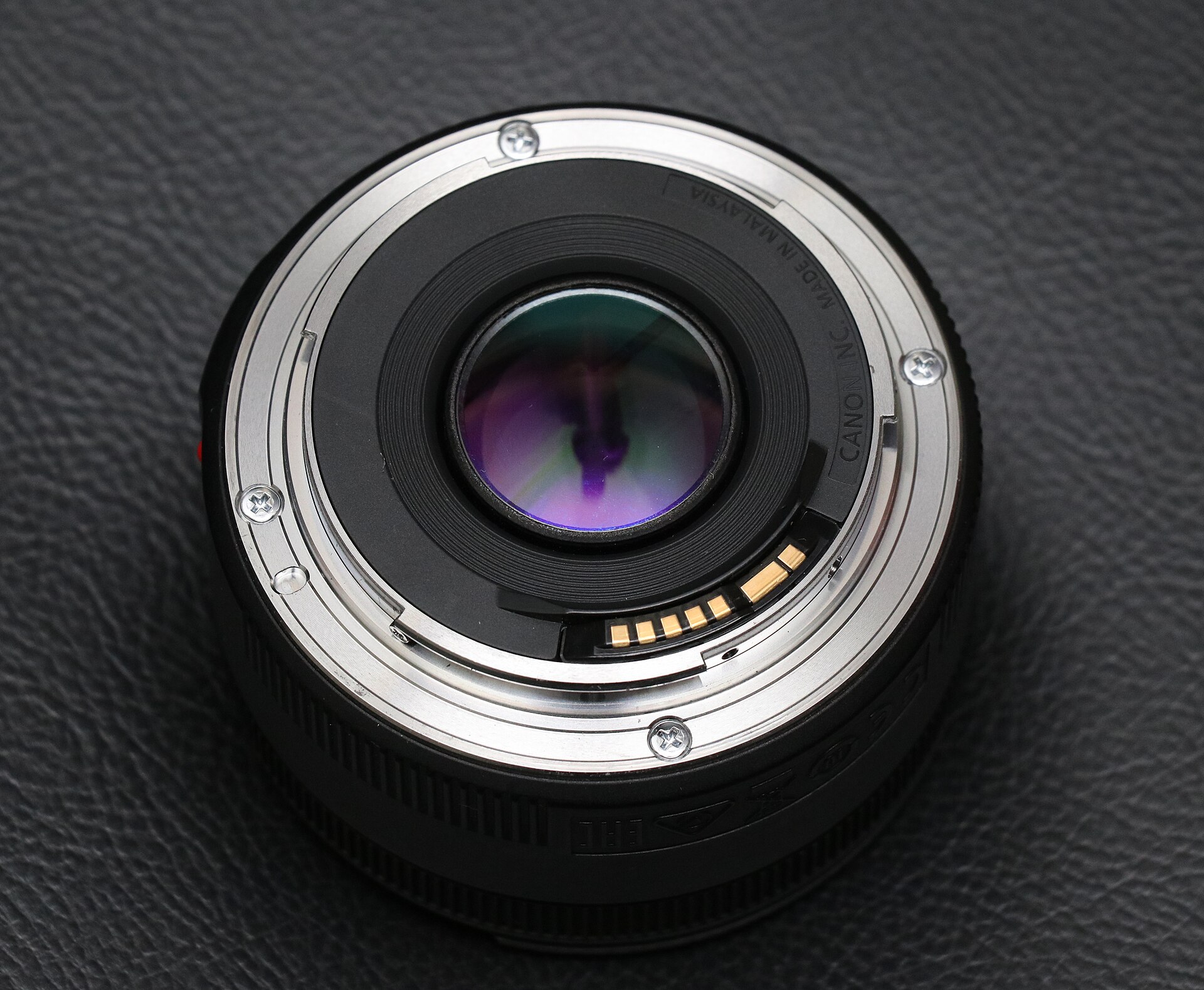 Rear of the Canon EF50mm f/1.8STM lens, showing metal EF mount and electronic contacts.