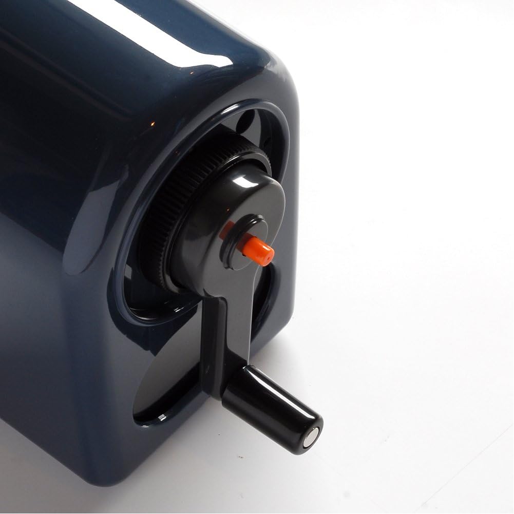 Rear close-up of the black uni KH-20 showing an orange push button in the center of the hand crank.