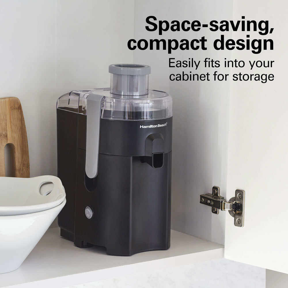Hamilton Beach 67502J compact juice extractor positioned beneath kitchen cabinets.