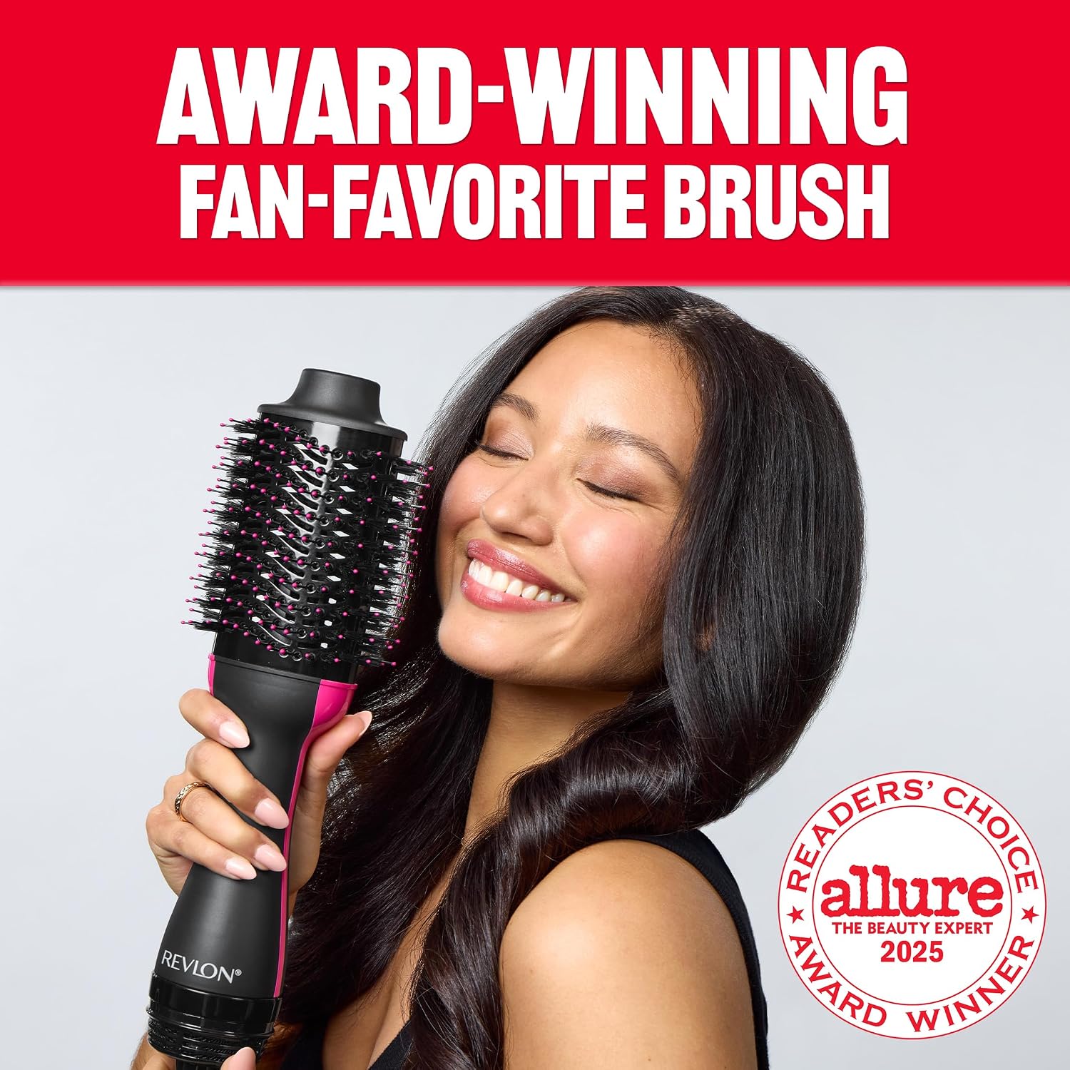 Supplier promotional photograph of a person holding the same black and pink Original dryer brush