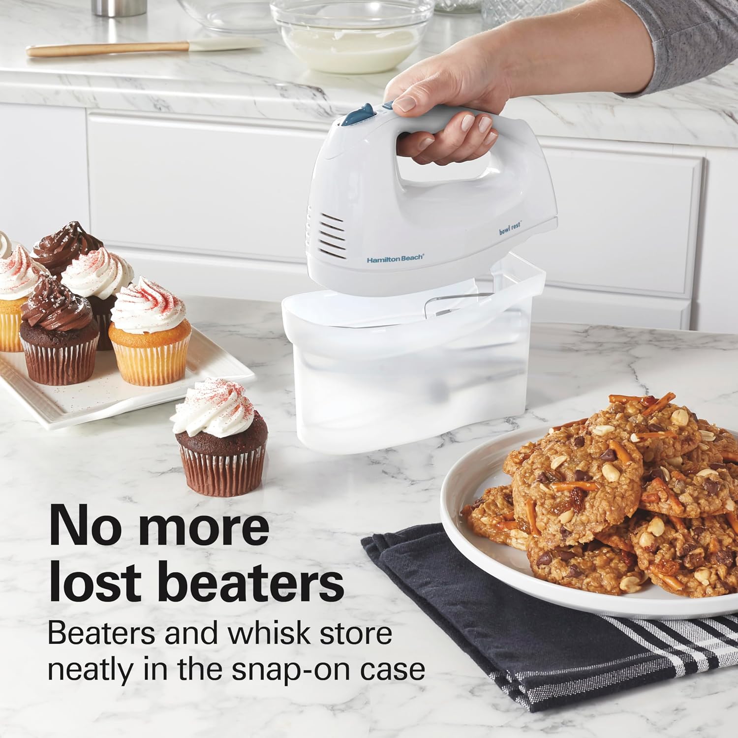 Matching white mixer placed onto its attachment storage case