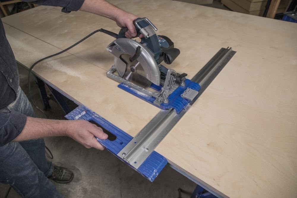A circular saw mounted on the legacyRip-Cut sled with the edgeguide contacting a plywood sheet.